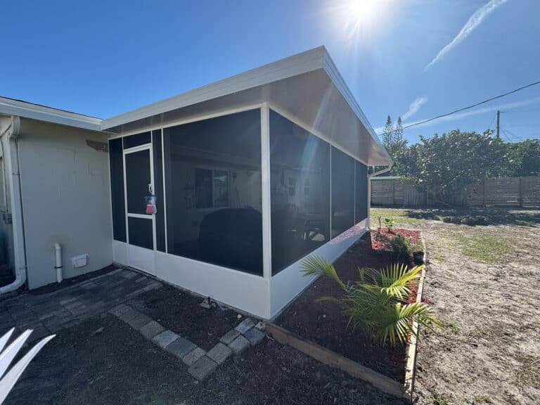 patio enclosure installation in Ocala, FL attached to residential backyard home
